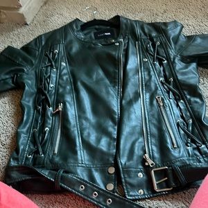 Women green leather jacket with cris cross leather straps